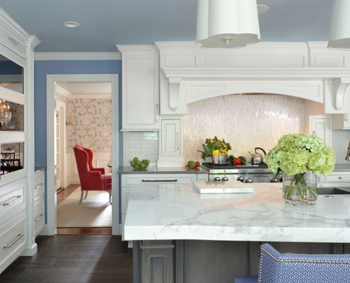 Transitional White Kitchen with Morning Mist Stain on Maple Island with Range Hood