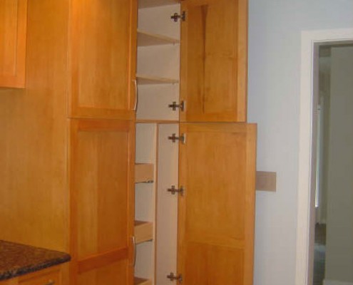 A Traditional stained kitchen cabinets