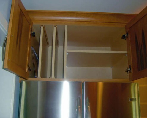 Traditional stained kitchen vertical shelf