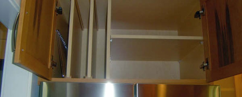 Traditional stained kitchen vertical shelf