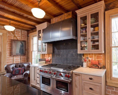 Traditional natural kitchen with range hood